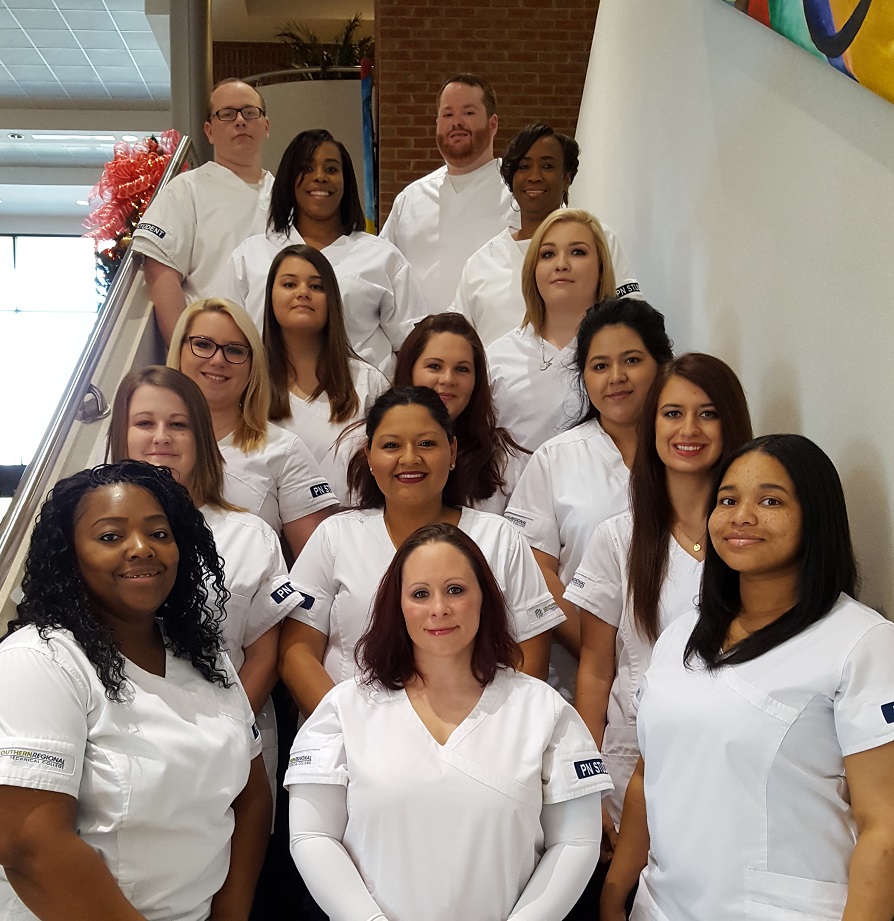 group of practical nursing students on stairs