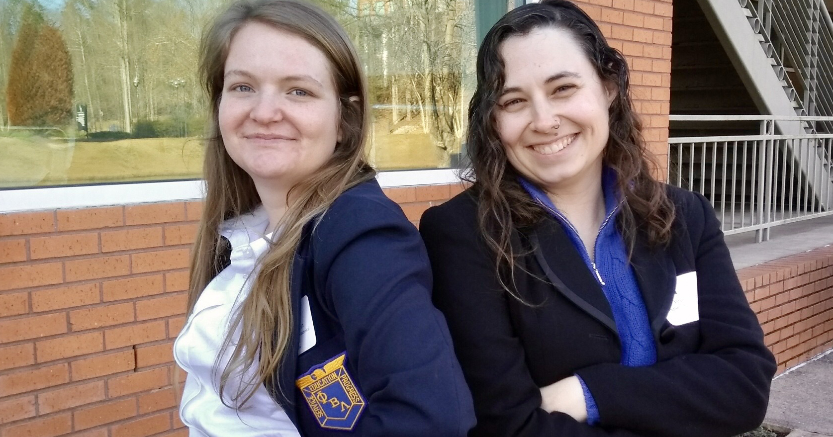 two young women in PBL blazers