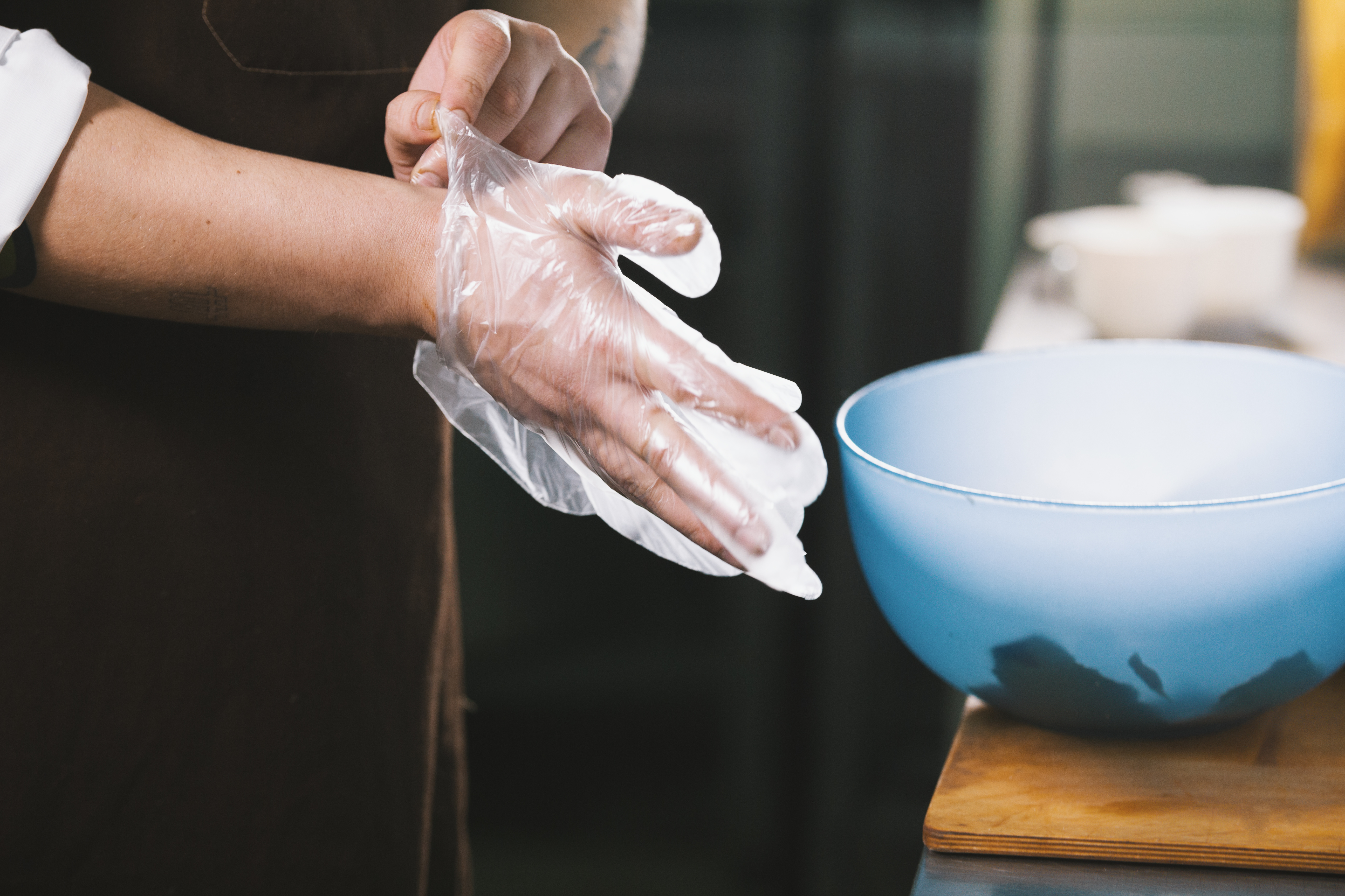 chef putting gloves on